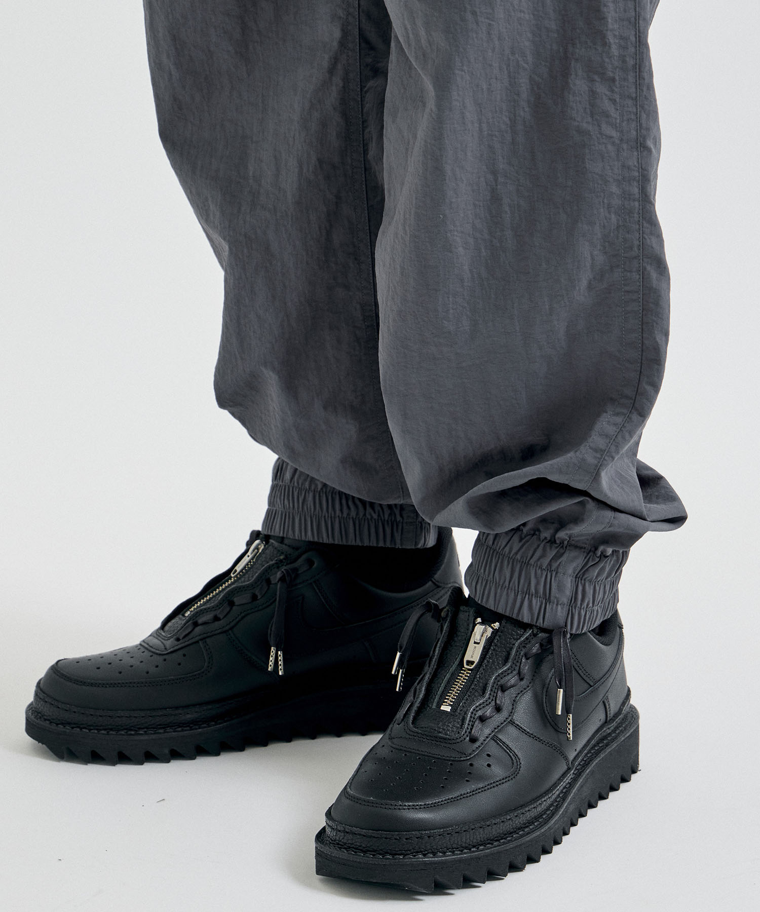 ×GRAMICCI ZIP OFF JOGGER PANTS White Mountaineering