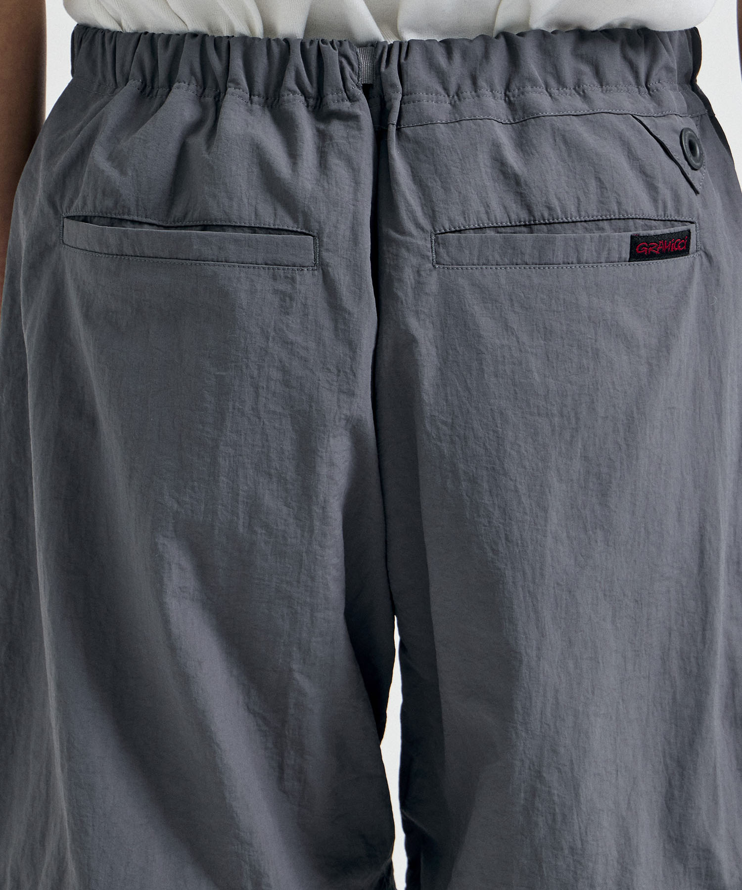 ×GRAMICCI ZIP OFF JOGGER PANTS White Mountaineering