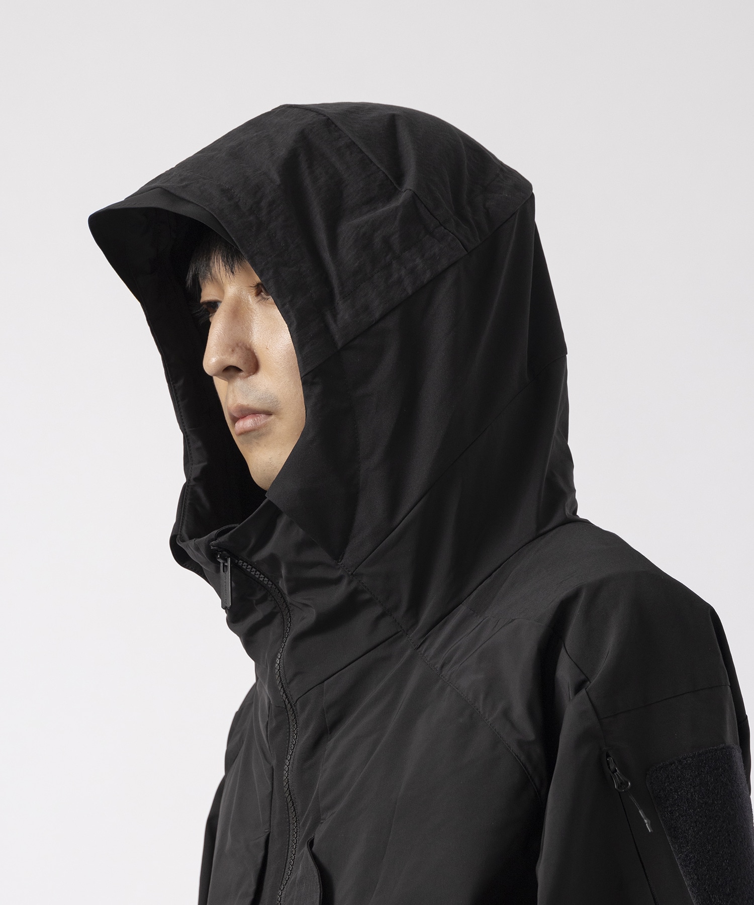 ×NEXUSVII HOODED LUGGAGE PARKA White Mountaineering