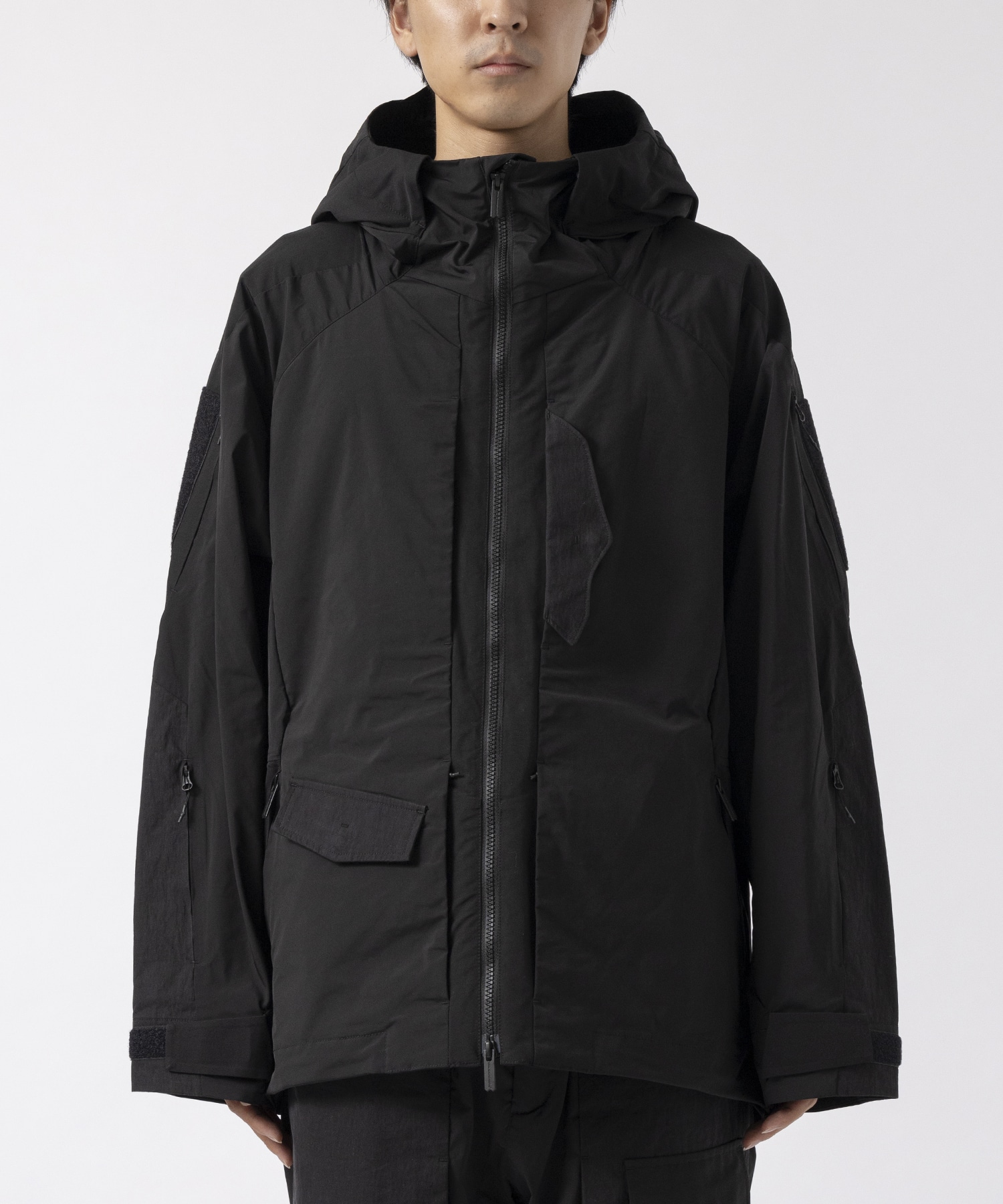 ×NEXUSVII HOODED LUGGAGE PARKA White Mountaineering