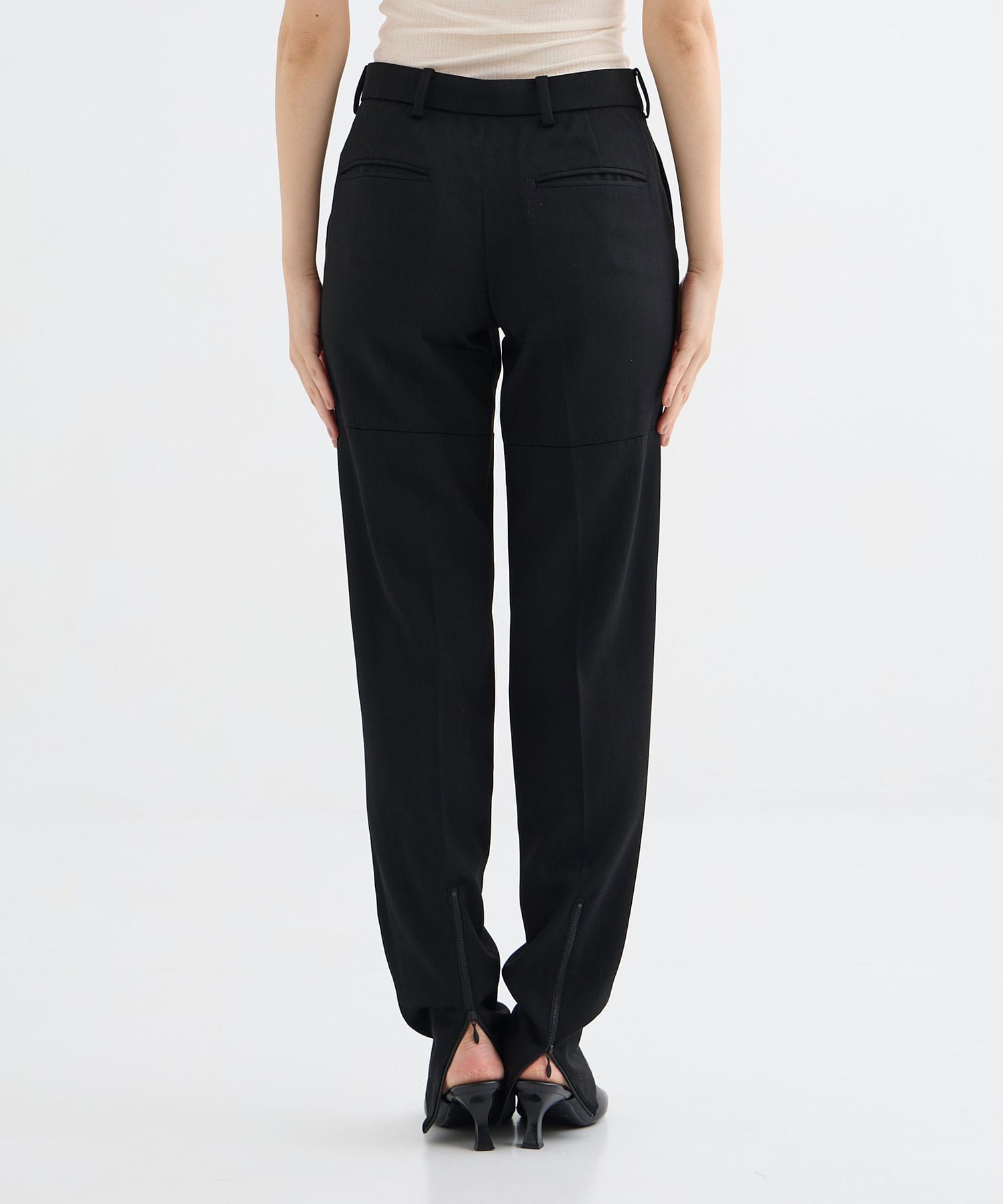 iconic garter-belted boot trousers GURTWEIN