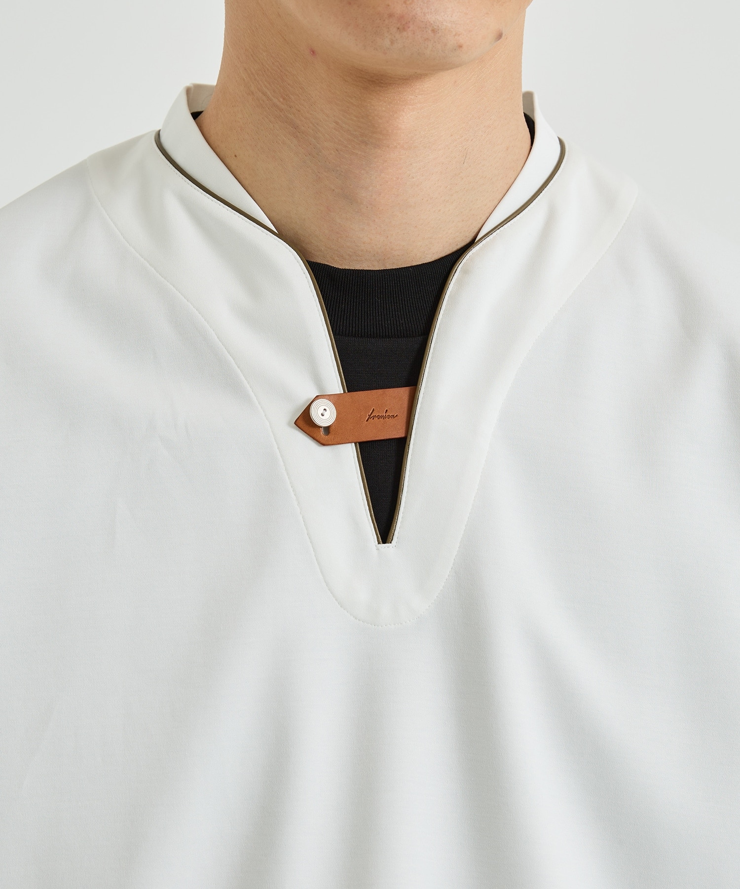 PULL OVER SHIRT WITH LEATHER TAB IRENISA