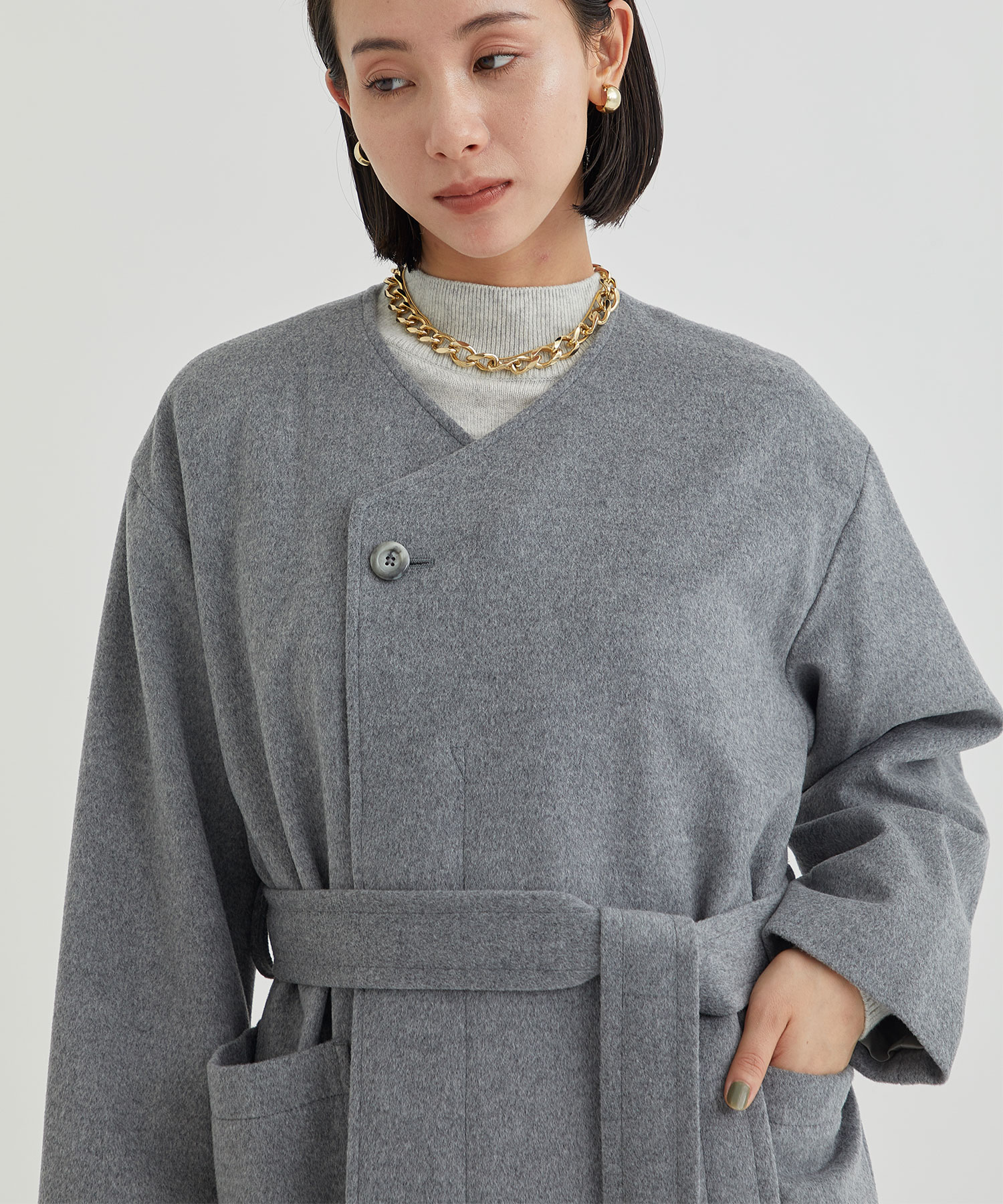 belted no collar wool coat THE PERMANENT EYE