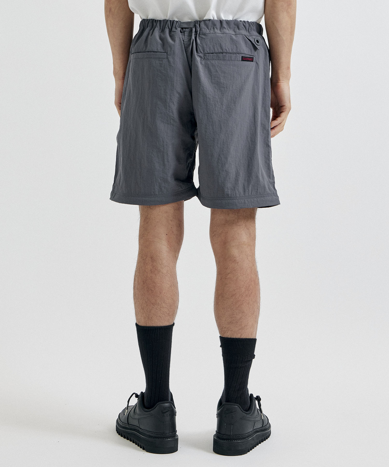 ×GRAMICCI ZIP OFF JOGGER PANTS White Mountaineering