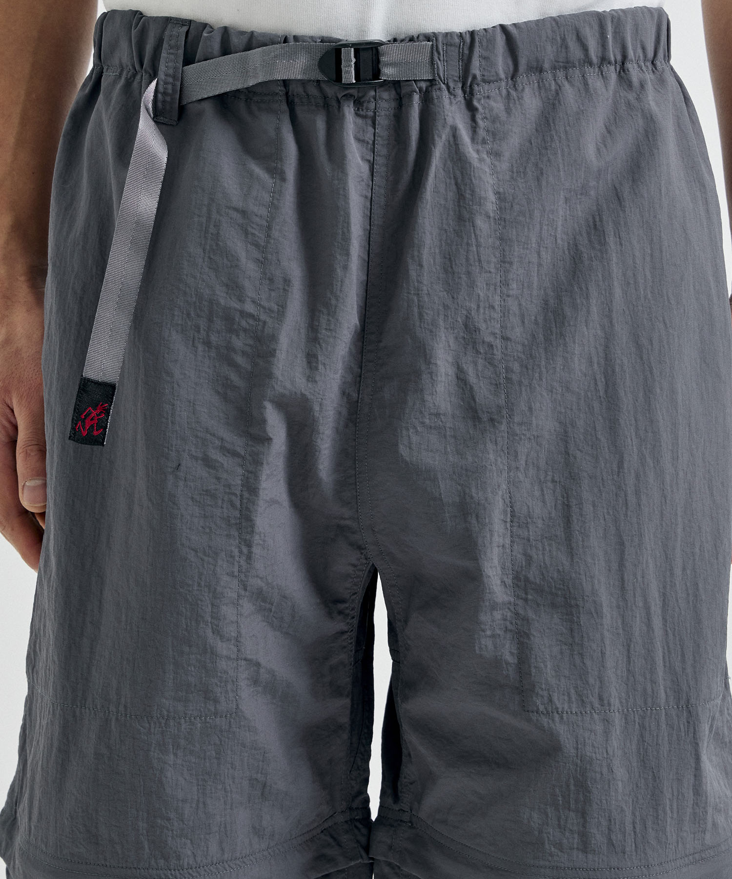 ×GRAMICCI ZIP OFF JOGGER PANTS White Mountaineering